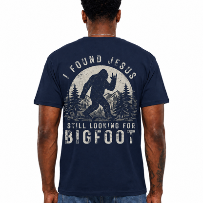 I Found Jesus Still Looking For Bigfoot Shirt Funny Christian Graphic Tee Gift For Men