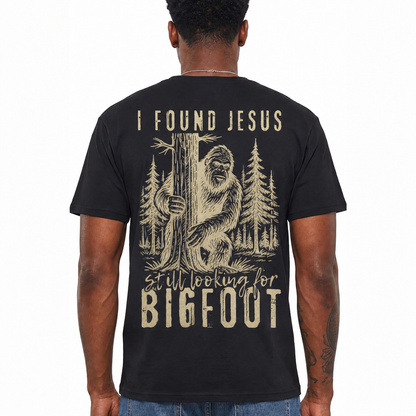 I Found Jesus Still Looking For Bigfoot Shirt Funny Christian Graphic Tee Gift for Men