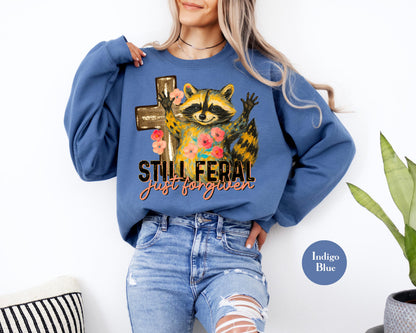 Funny Still Feral Just Forgiven Sweatshirt | Christian Raccoon TShirt | Vintage Funny Faith Shirt | Religious Apparel Shirt Tee Sweatshirt