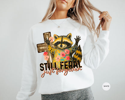 Funny Still Feral Just Forgiven Sweatshirt | Christian Raccoon TShirt | Vintage Funny Faith Shirt | Religious Apparel Shirt Tee Sweatshirt