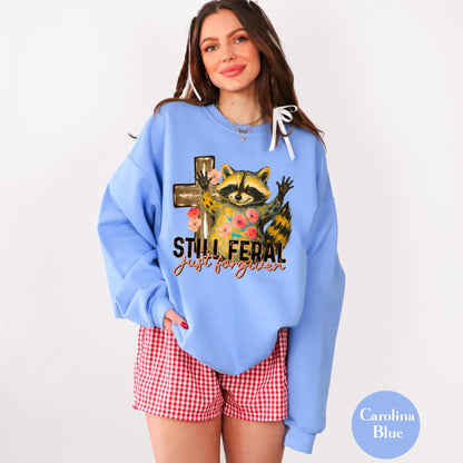 Funny Still Feral Just Forgiven Sweatshirt | Christian Raccoon TShirt | Vintage Funny Faith Shirt | Religious Apparel Shirt Tee Sweatshirt