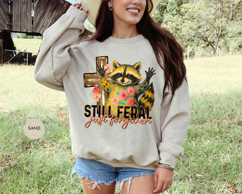 Funny Still Feral Just Forgiven Sweatshirt | Christian Raccoon TShirt | Vintage Funny Faith Shirt | Religious Apparel Shirt Tee Sweatshirt