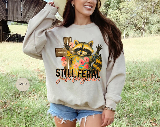 Funny Still Feral Just Forgiven Sweatshirt | Christian Raccoon TShirt | Vintage Funny Faith Shirt | Religious Apparel Shirt Tee Sweatshirt